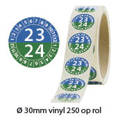 Keuringssticker op rol rond met jaartal 2023-2024 Keuringssticker op rol rond met jaartal 2023-2024